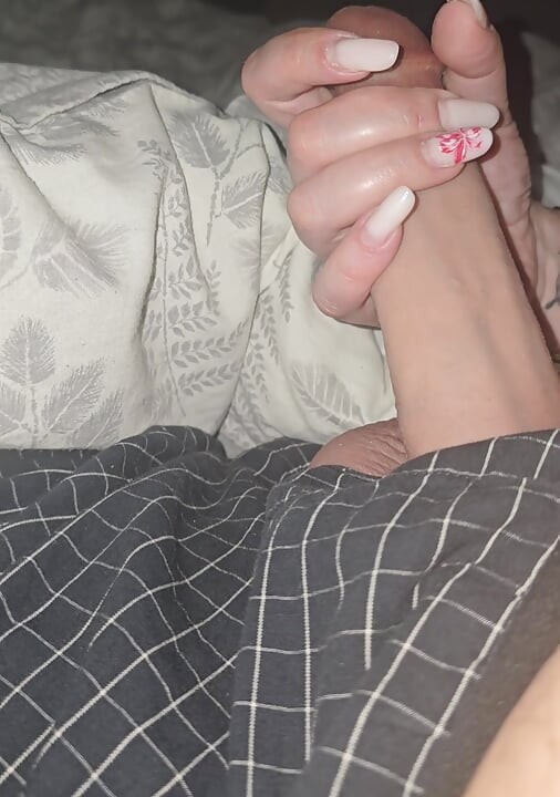 Step mom pulled out step son dick from his shorts and gave him a handjob