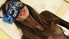 Thai in lingerie has a mask on her face and wet pussy