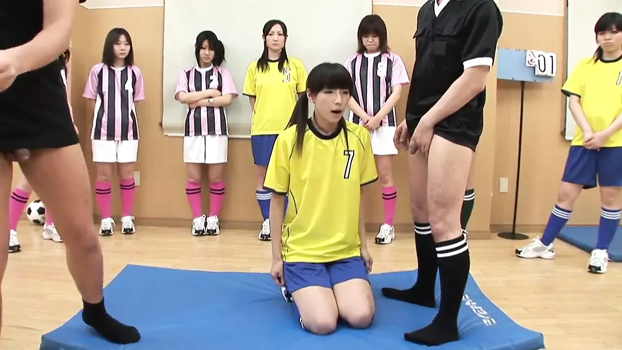 Sexy teen is on her knees sucking two cocks for the team