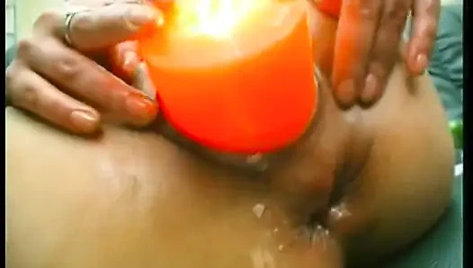 Brunette mature slut wearing stockings while drilling her holes with food and huge candle