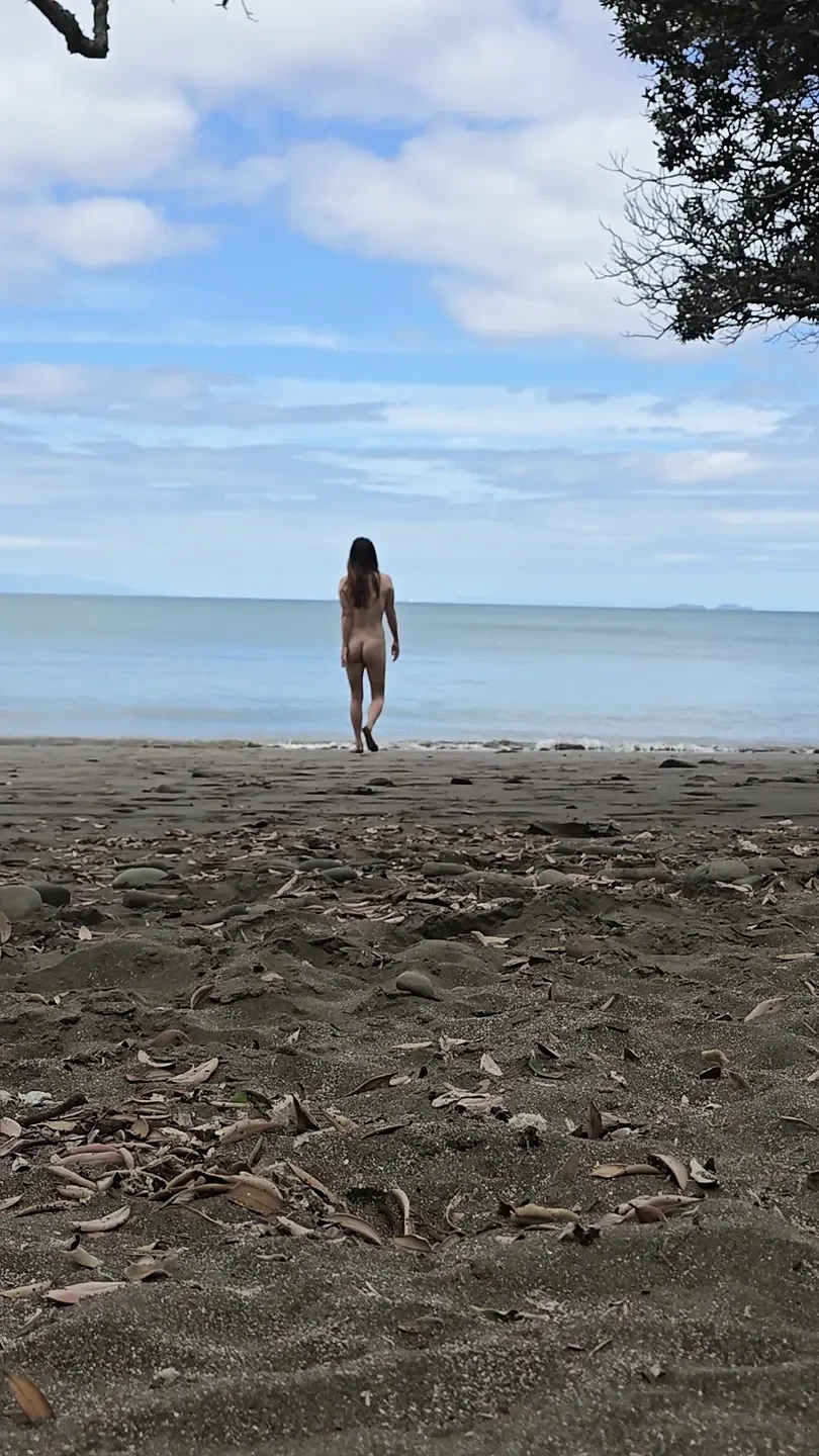 Korean teen walking naked on the beach with perfect tits