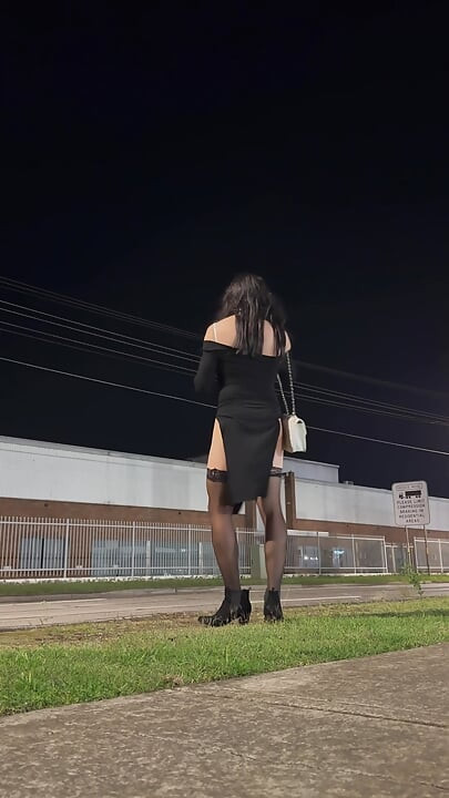 Asian cross dresser hooker plays with ass on a public street
