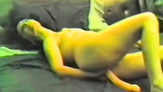 A horny brunette jerking off with two dildos