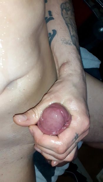 Punk jerks off his oiled cock until he's off