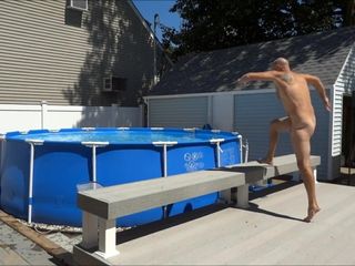 Naked while jumping into the pool
