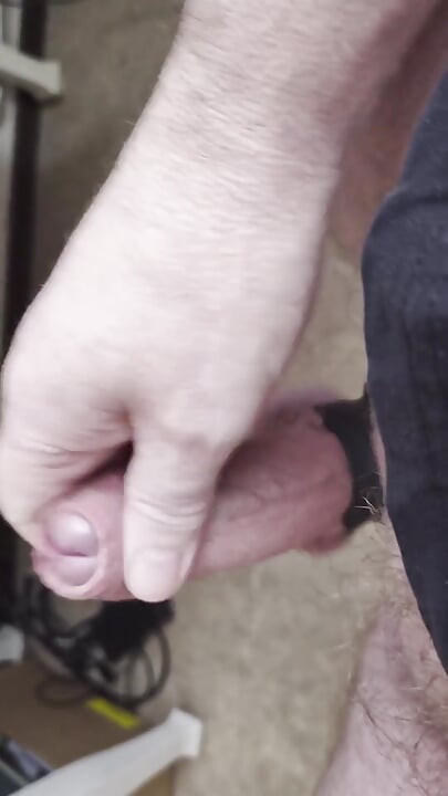 My Friend Sits in a Chair and Jerks His Cock While Watching the Video Until He Orgasms