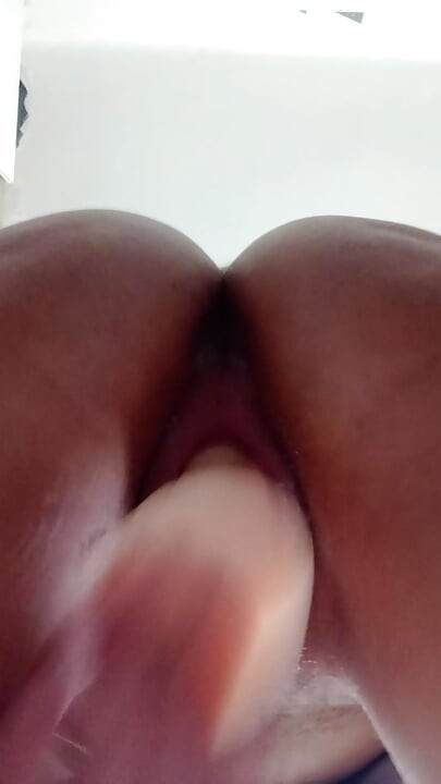 Young slut fucks her creamy pink pussy