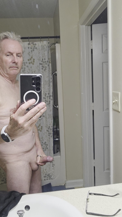 Masturbating