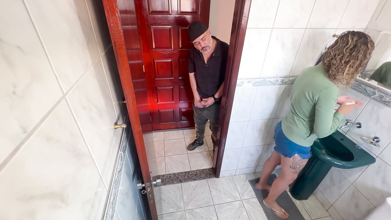 A relative rubs against his step-niece in the bathroom.