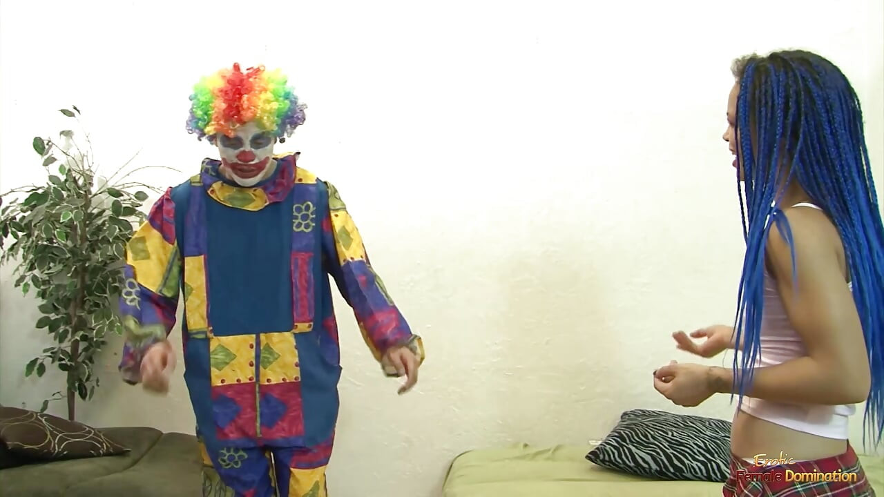 Some unusual cosplay fuckery between a striking blue hair girl and a miserable horndog clown