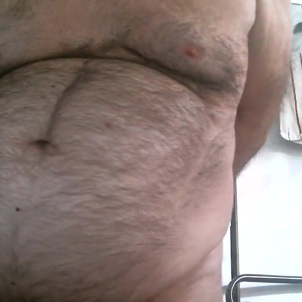 Coach Karl Shows off His Furry Belly