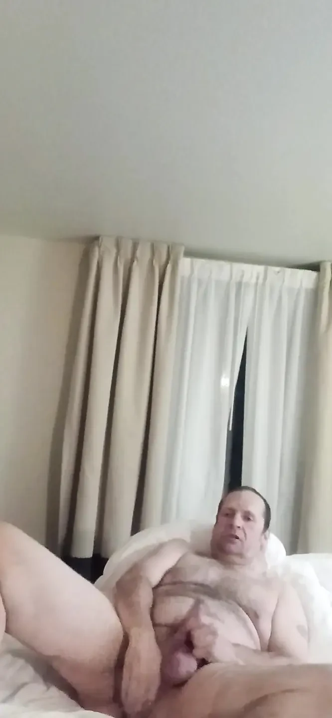 He strokes and talks dirty until she can't take it