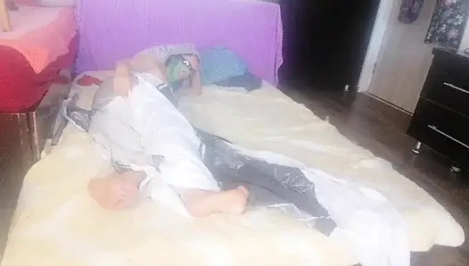 Sensual massage of a hot couple with oil on the body.