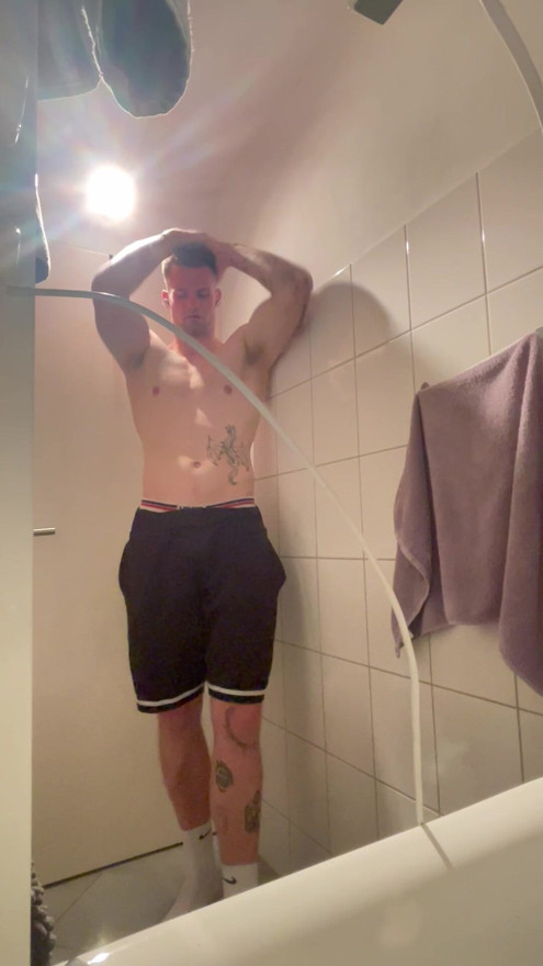 Showering muscle men