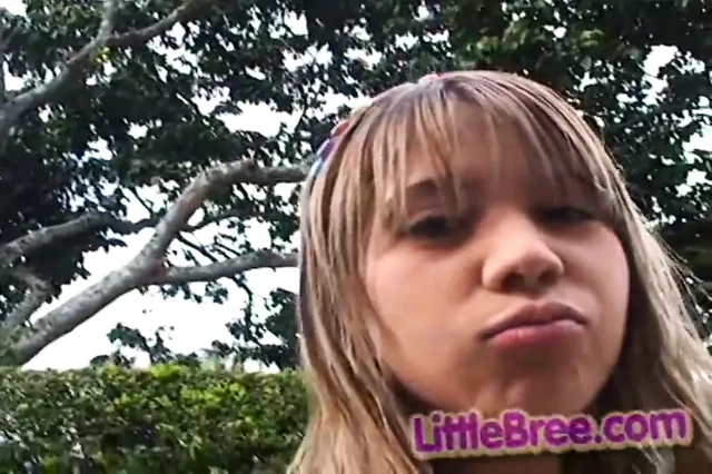 Little Latina spreading her pussy