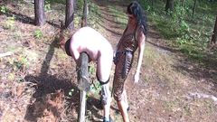Strapon fucked in the forest