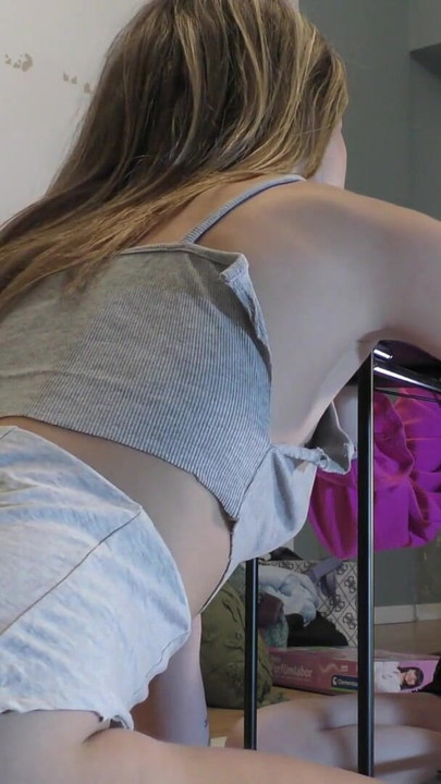 Emotional moment from "Two Girl play Mini Bowling Game without any Underwear or Bra"