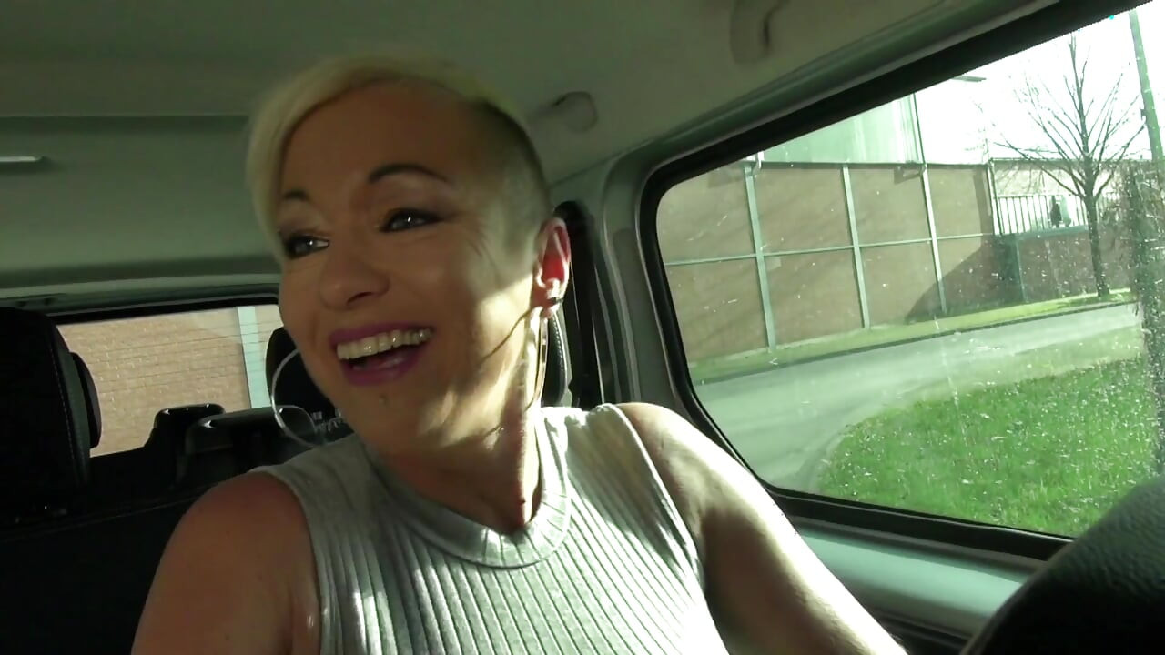 Blonde MILF sucks good cock in the car