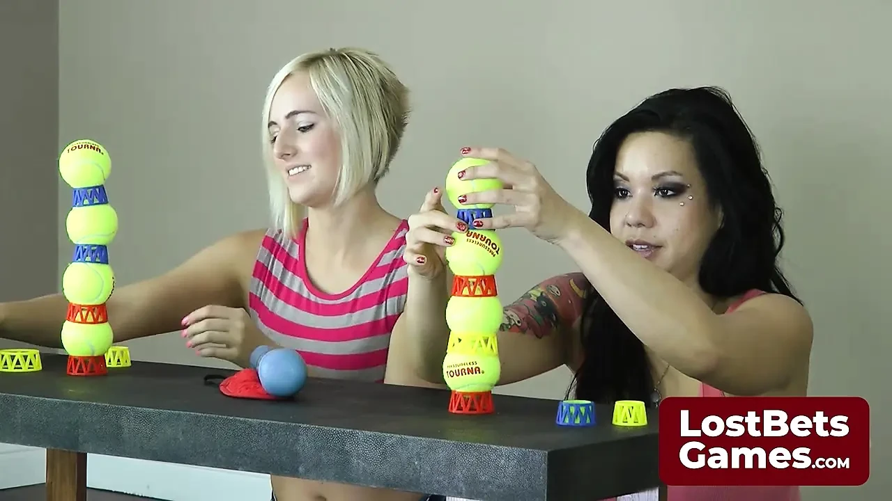 Kate and Kimmy dive into a playful game of Strip Ballstaks