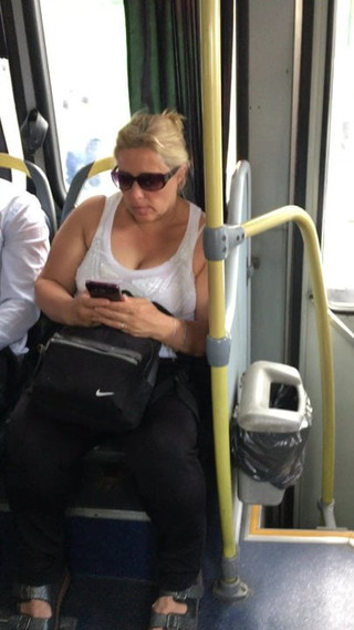 MILF tits bouncing on the bus