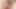 Brunette ladyboy with big tits strokes her small cock until