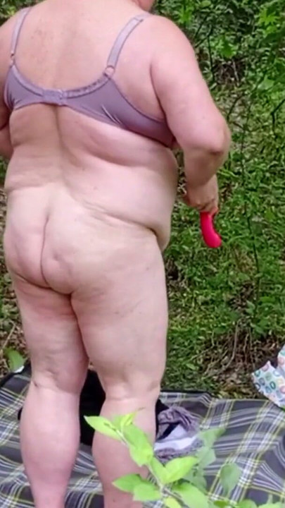 neighbor undressed in a public park and masturbates her pussy | Clip 1