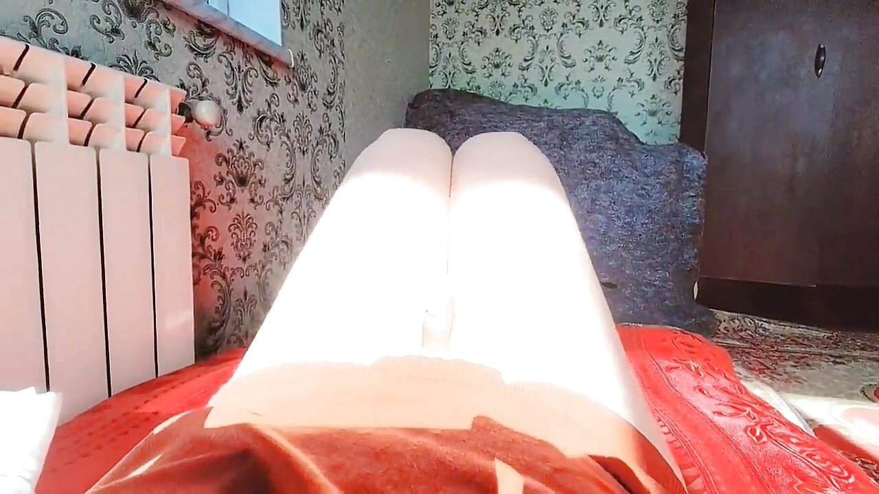 Playful trans girl showing thigh tattoo in short skirt