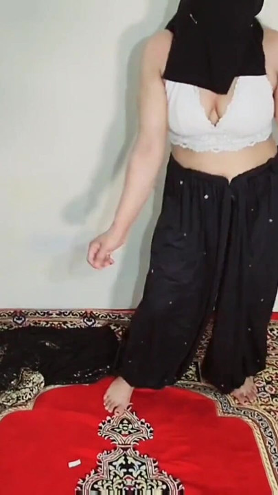 Emotional moment from "Arabic sexy hot girl wearing black hijab in house doing sensual dance, Desi Indian slut Amrozia"