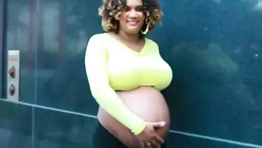 pregnant street-A mother who loves her pregnant belly