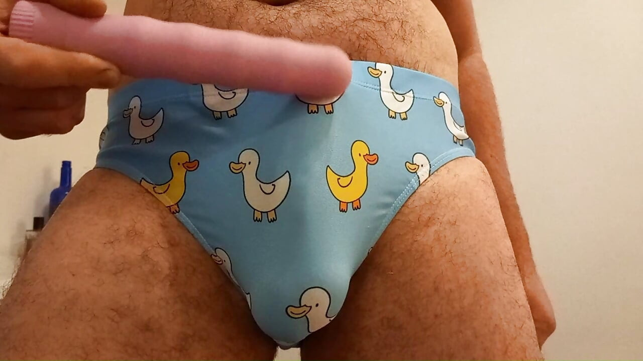 Speedo cum. Rubbing, vibrating, masturbating small penis bulge in speedo, swim trunks, brief. Please humiliate in the comments.