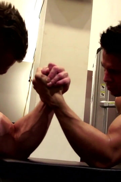 Amateur Fitness Guys Arm Wrestle in the Gym