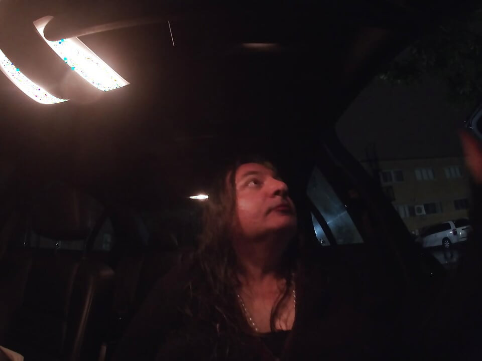 Mature sissy CD out in the rain in A parking lot in public masturbation.