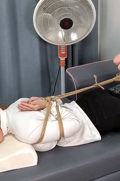 The Extreme Restraints of a Barefoot Girl, Playing with Her Bare Feet