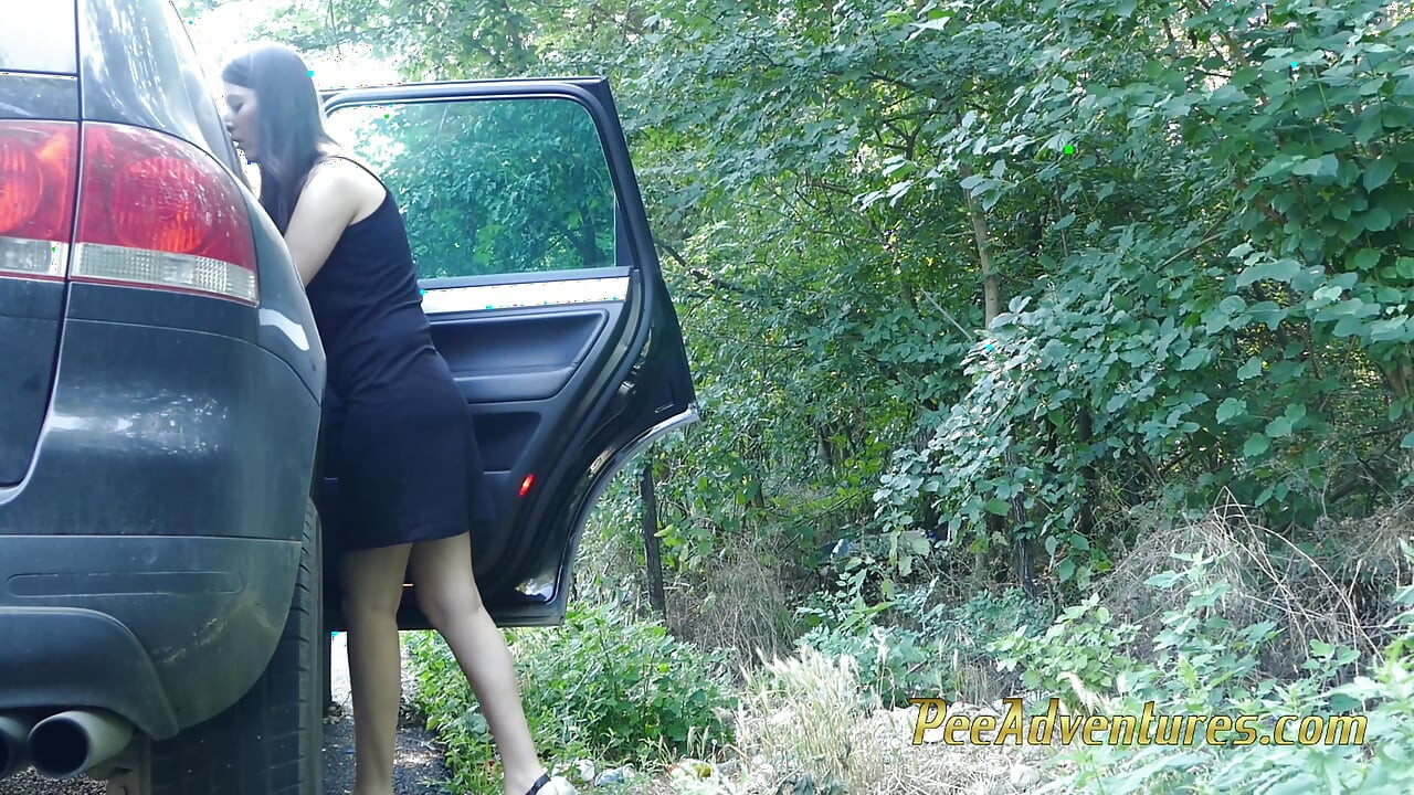 Waiting for her boyfriend with her bladder full - Changing her pee stained clothes outside