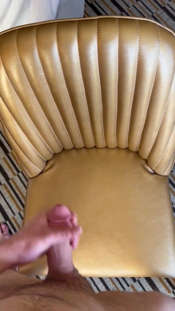 Gay horny guy bust a nut all over a hotel leather chair.