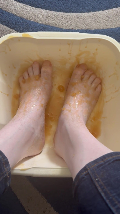 Kinky and Horny UK slut bathes feet in honey