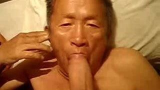 Old Asian Man Eating a Big Cock