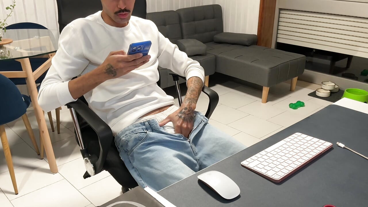 Skinny guy in jeans, pulls his dick out and jerks off on webcam.