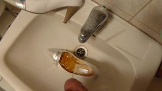 Piss in wifes silver and white high heel shoe