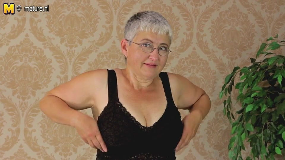 Naughty mature slut teasing herself with her toy