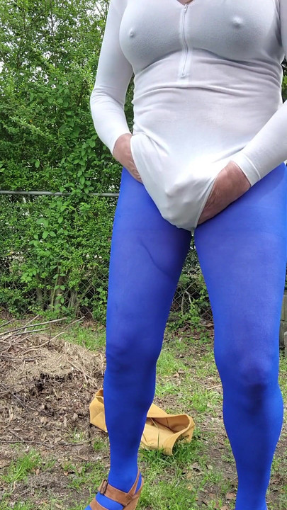 Key moment from "Gay Sexy Cd outdoors teasing and caressing myself in nylon tights, leotard, miniskirt."