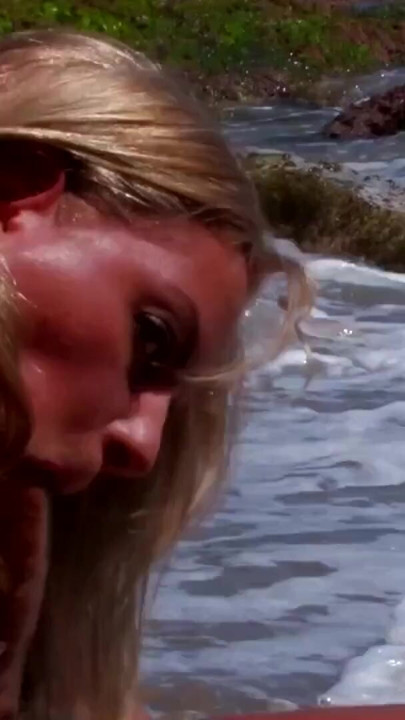 Key moment from "Sunbathing gets extra fun when a fit blonde nudist sucks"