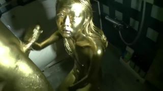 Sexo japonés pintado de oro