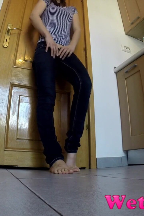 Wetting Her Jeans in the Kitchen