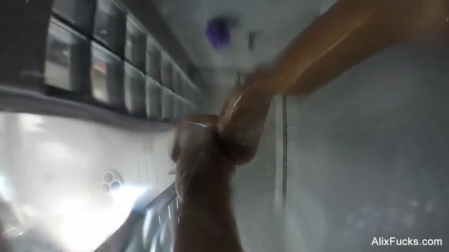 Busty blonde Alix Lynx takes a steamy shower