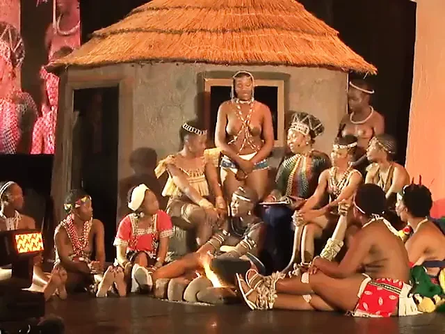 Topless African girl with huge areolas tells some story