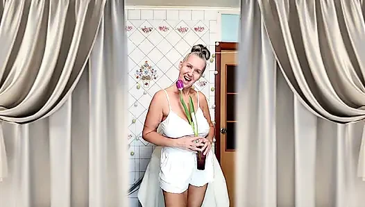 Hot housewife Lukerya. A mature Ukrainian woman shows off her figure and poses for the camera at home.