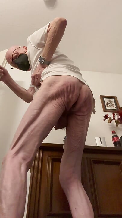 The old man punishes himself with his hand, with the stick, electric shock, self-punishment