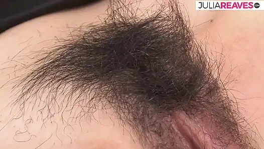 A hairy girl bends over as a huge cock drills her pussy from behind