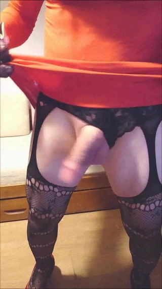 Crossdresser in Red Dress shows her big Cock